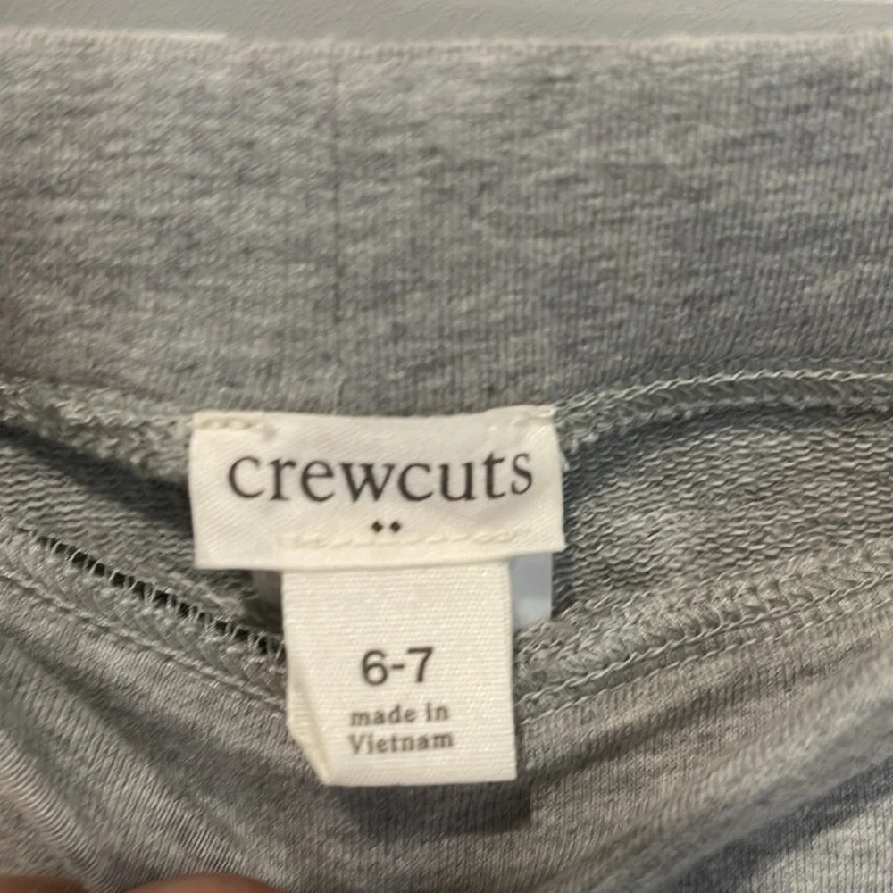 Kids Crewcuts grey with rainbow stripes.  Size 6-7